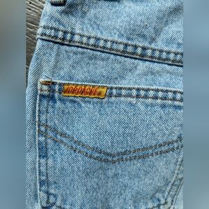 Vintage Jordache Jeans Size 23 waist Straight eg, high Waisted, and light wash.